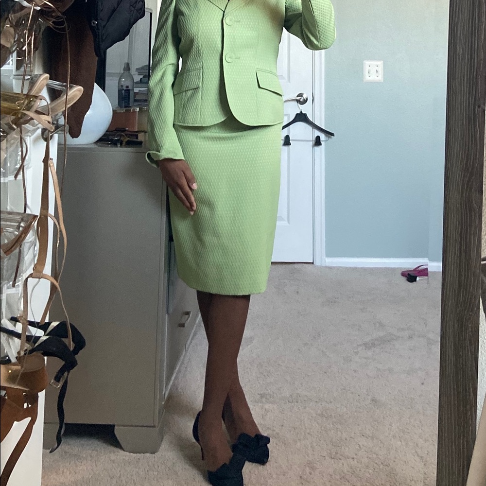 A green business suit